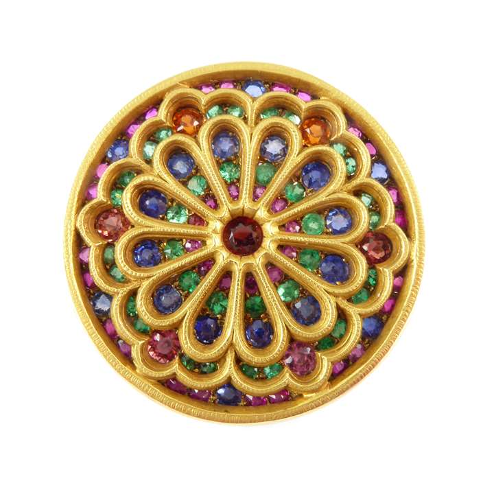 19th century sapphire, ruby, emerald, gem and gold gothic revival brooch, c.1880, in the form of a round stained glass church window,